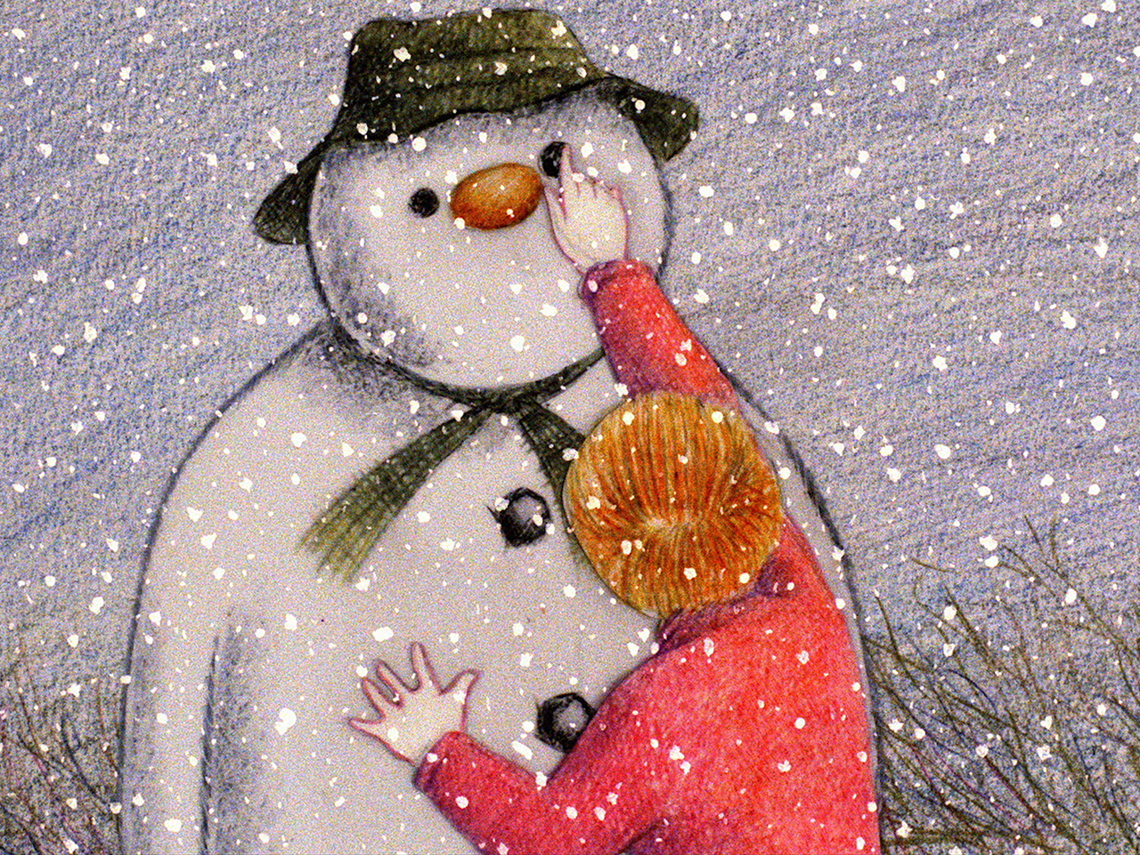 An image of the boy building the Snowman from the film The Snowman